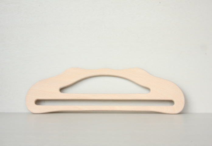 a wooden bag handles
